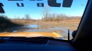 A Ford Bronco owner destroys the car's 4WD transmission after crashing into a mud pit