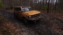 A Ford Bronco owner destroys the car's 4WD transmission after crashing into a mud pit