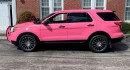 This 2013 Ford Explorer is an Interceptor turned into a Barbie vehicle with custom pink job, matching interior
