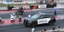 Ford Explorer police cruiser vs. quad bike