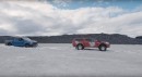 Ford Raptor towed out of snow by a Hilux