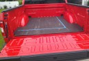 2022 Ford Maverick bed dimensions taped inside 5.5ft Ford F-150 cargo area on Maverick Truck Club
