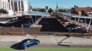 Multiple Tesla Cars Charging at a Covered Supercharger