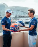 Nicholas Latifi and George Russel swap signed helmets to say goodbye to each other