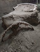 Near intact horse-drawn four-wheel iron chariot used by the elites found in Pompeii