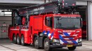 This fire truck has a reach of aerial work platform has a range of 60 meters (197 feet)