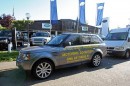Range Rover parked Outside Dealership in Cardiff with Angry Signs