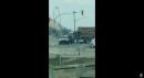 Dodge Ram tows broken logging truck out of intersection on ViralHog