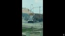 Dodge Ram tows broken logging truck out of intersection on ViralHog
