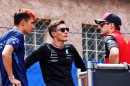 Williams driver Alex Albon speaking with George Russell and Charles Leclerc