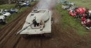 Geri Halliwell goes car-smashing with a tank, makes it all about Girl Power