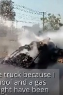 Pickup with trailer on fire shown speeding on Thai town street