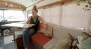 School bus transformed into a motorhome with a dog crate and a fuctional kitchen