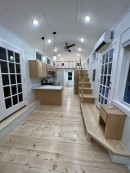 The Vermont Cottage tiny home defies tiny expectations with plenty of space, storage, and quality finishes