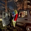 Man dressed in a Grinch costume crashes his Honda SUV