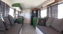 Gus Gus is a school bus with plenty of space for a spacious living room, a functional kitchen, and three bedrooms