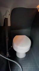 Guy installs vacuum toilet in Toyota SUV