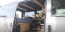 This 2003 Chevy Astro van has a pull-out kitchen