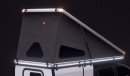 Hardsider pop-up pickup camper with innovative hard walls that fold