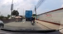 Dashcam video shows man survive after a truck runs over his head