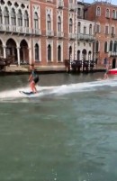 Two Australians go surfing on the canals in Venice, are arrested later