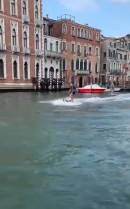 Two Australians go surfing on the canals in Venice, are arrested later