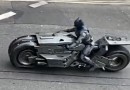 Batman is seen riding the Batcycle in upcoming The Flash movie