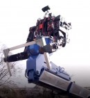 Prototype of a gigantic robot worker fixes railway wires in Japan