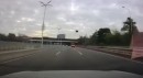 Tesla Model S loses its top while driving down a highway in China