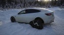 Snow-tracked Tesla Model 3