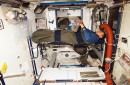 Astronaut sleeping in space