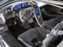 Porsche 918 Spyder, McLaren P1 GTR, and Ferrari LaFerrari for sale at Villa Erba auction