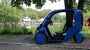 Hopper is an electric three-wheeler with an open-sided body