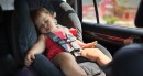 Toddler in back seat