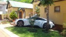 Inexperienced employee took boss' BMW i8 for a ride, crashed it while backing out of the garage