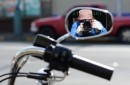 Motorcycle mirror photographer