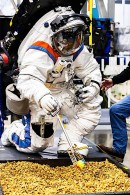 NASA and Axiom Space engineers testing the Axiom Extravehicular Mobility Unit