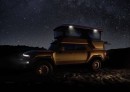 The Hummer EV SUV got a pop-up tent on the roof