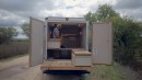Inconspicuous Box Truck Camper Hides a Game-Changing Layout With a Unique Levitating Desk