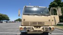 Insane $105K Army Truck RV Features a Motorcycle Garage and an Elevator Bed
