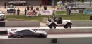 modified Jeep CJ-7 vs Ford Mustang drag race