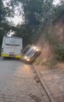 Jeep Compass tries to pass bus on narrow road, spectacularly fails