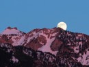 Nearly full moon over the Wasatch Mountains near Salt Lake City in 2019