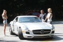 Justin Bieber and his silver Mercedes-Benz SLS AMG