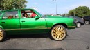 Chevrolet Malibu four-door is Kandy Green and riding on gold 24s by WhipAddict