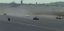 Motorcycle drag races fighter jet and Formula 1 car