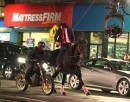 Keanu Reeves rides horse, chases down bad guy on bike on "John Wick 3: Parabellum" movie set