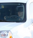 Kendra Wilkinson driving her GMC