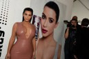 Kim Kardashian Shows Up in a Pink Latex Dress at Formula One Event