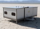 The KlappCaravan aims to triple living space in camp mode by expanding laterally